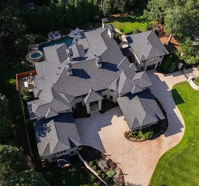 Dimensional shingle roofing on a home with multiple roof planes